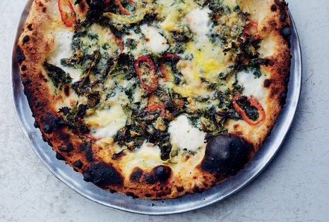 Pizza with nettles, raclette & Fresno chile