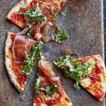 Pizza with prosciutto and sheep-milk cheese