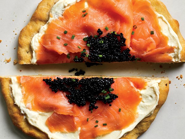Pizza with smoked salmon, crème fraîche, and caviar