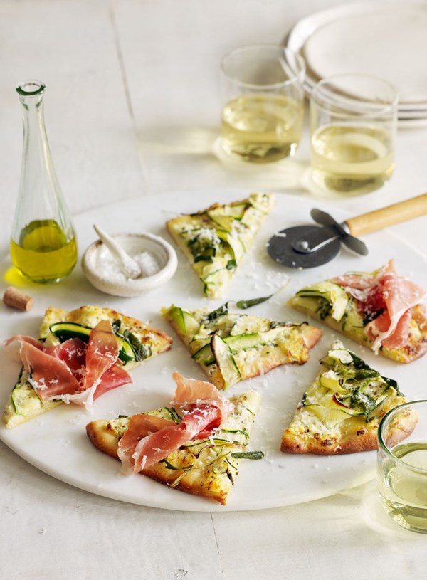 Pizza with zucchini, Parmesan and prosciutto