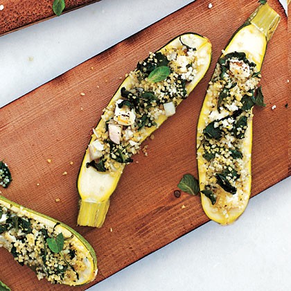Plank-grilled zucchini with couscous, spinach, and feta stuffing