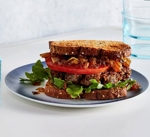 Plant-based smashed burgers with caramelized onion relish