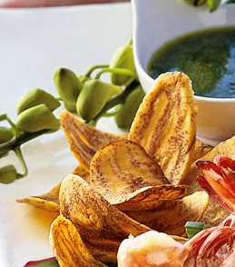 Plantain chips with warm cilantro dipping sauce
