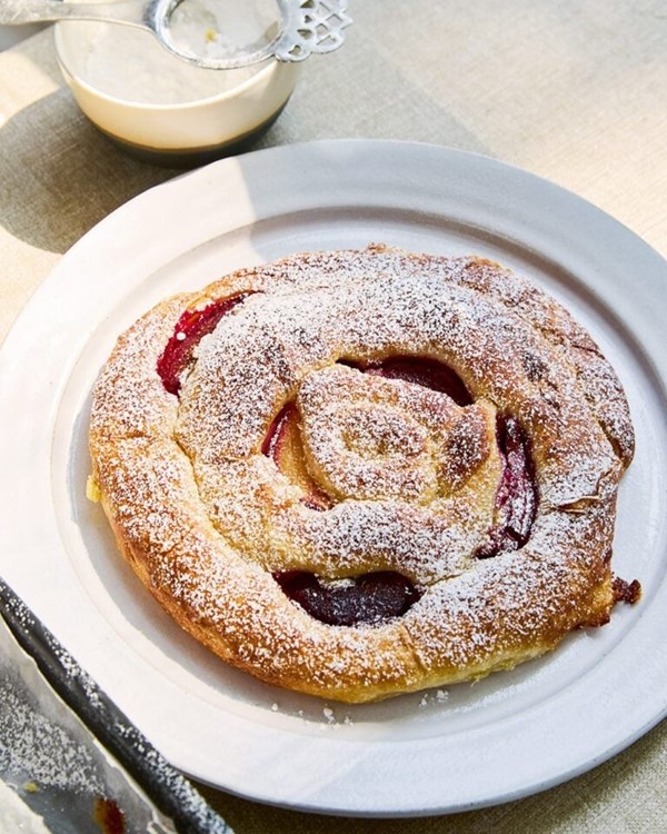 Plum and frangipane ensaïmadas