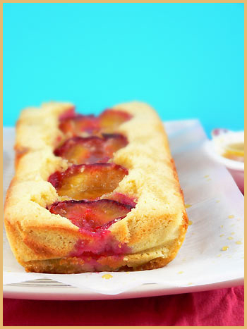 Plum cake and orange sauce