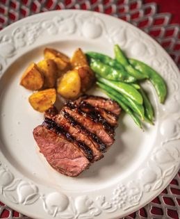 Plum-cherry glazed duck breasts