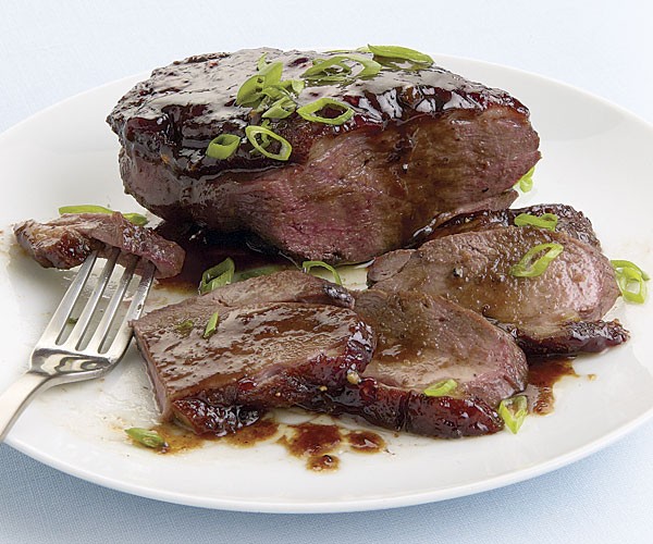 Plum-glazed duck breasts