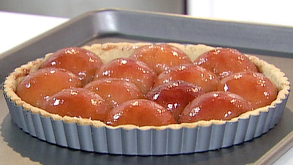 Plum tart with almond pastry crust
