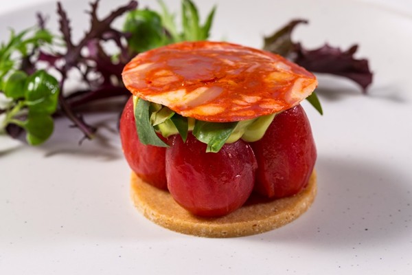 Plum tomato tart with Parmesan biscuit, avocado and chorizo