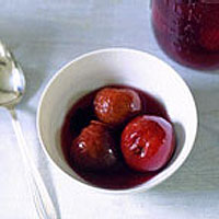 Plums in anise- and orange-spiced Armagnac