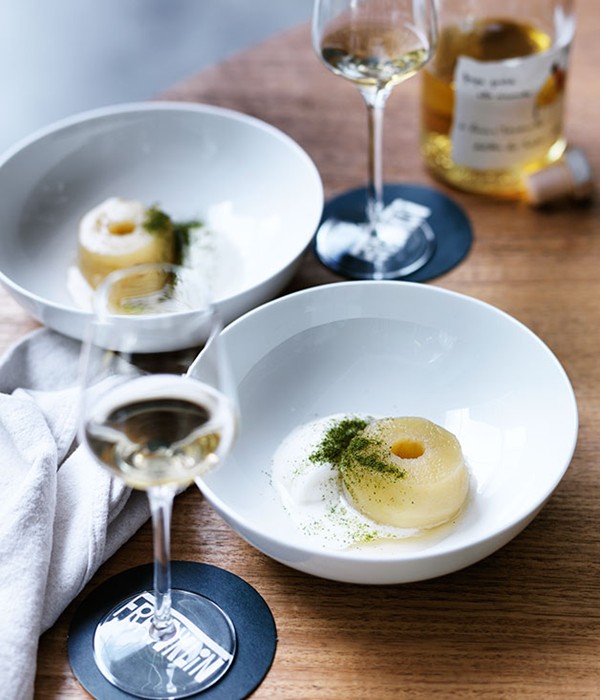 Poached apple with sweetened goat's curd and bay leaf