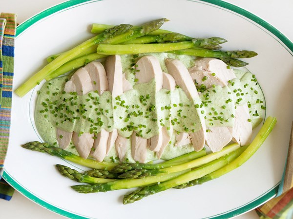 Poached chicken and asparagus with green goddess sauce
