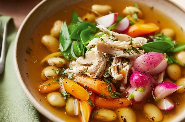 Poached chicken breast in a summer vegetable & butter bean broth