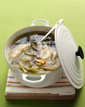 Poached chicken breasts and chicken broth