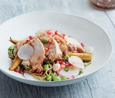 Poached chicken, green tea noodles, grilled baby corn, daikon, pomegranate and lemongrass