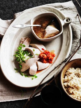 Poached chicken, rice and ginger-scented broth