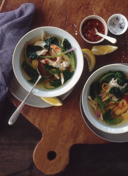 Poached chicken soup with spinach