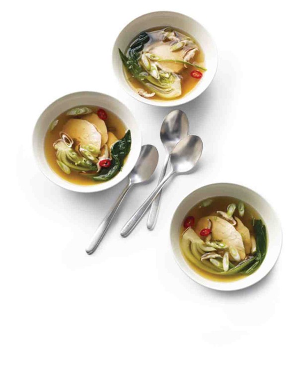 Poached chicken with bok choy in ginger broth