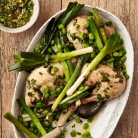 Poached chicken with leeks, broad beans and herby sauce