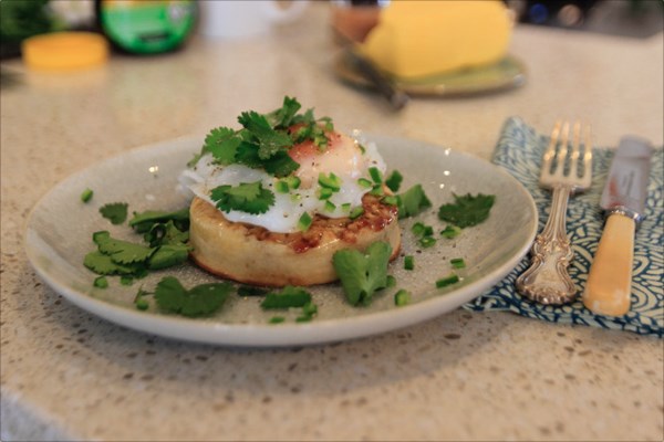 Poached duck egg on a crumpet with green chilli & coriander