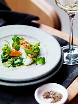 Poached egg and nettle sauce