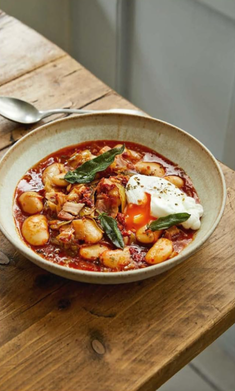 Poached egg with 'nduja sage and leek butter beans