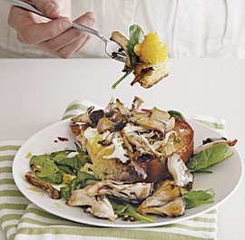 Poached eggs on brioche toast with garlicky mushrooms