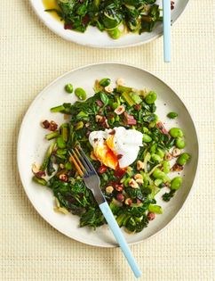 Poached eggs on greens