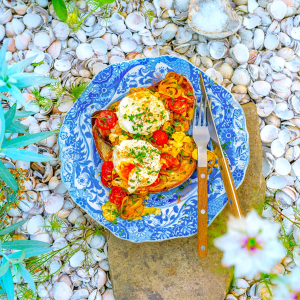 Poached eggs on toast, summer piccalilli salad