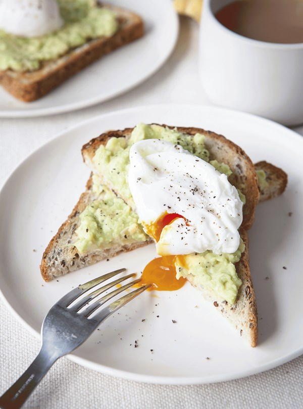 Poached eggs with avocado on toast