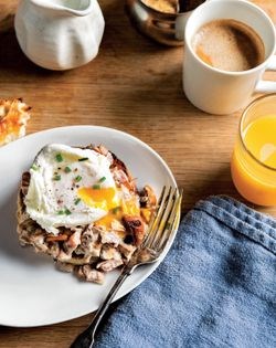Poached eggs with chanterelle and ham cream sauce [Jack Czarnecki]