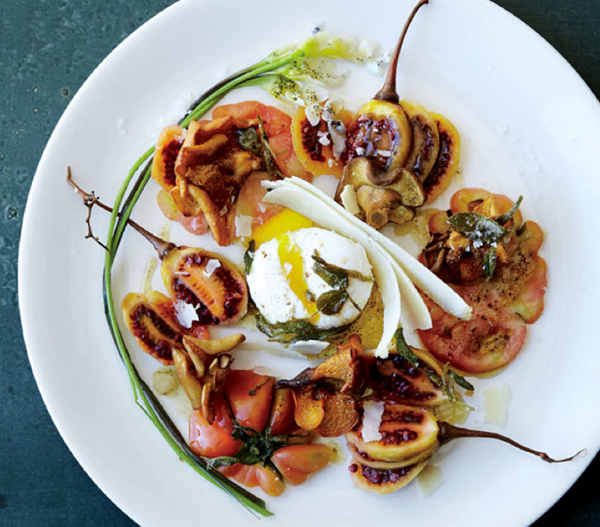 Poached eggs with mushrooms, tamarillo, and sage