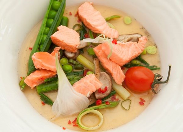 Poached fjord trout in asparagus, garlic and ginger broth