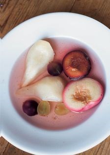 Poached fruit in vanilla syrup