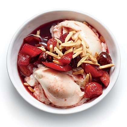 Poached fruit over vanilla frozen yogurt