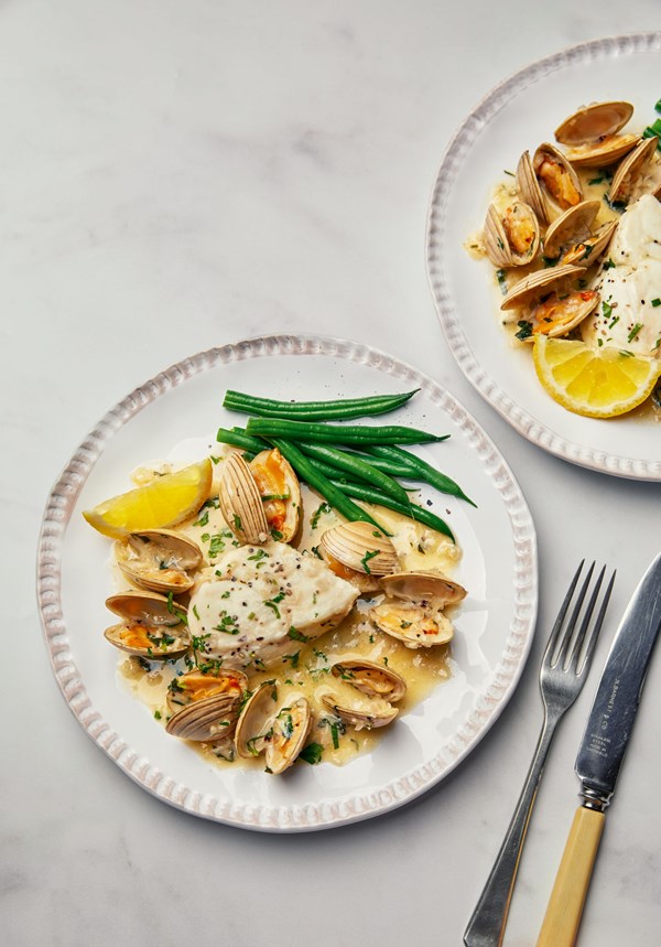 Poached halibut with clam and crème fraîche sauce