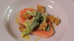 Poached king salmon with Caesar salad and fried clams