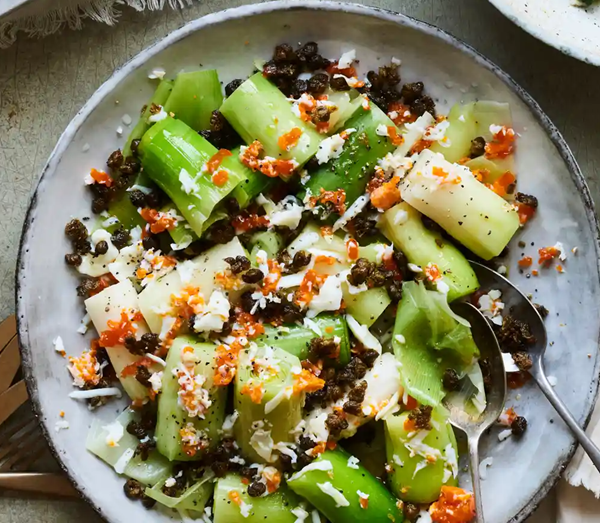 Poached leeks with grated egg and fried capers