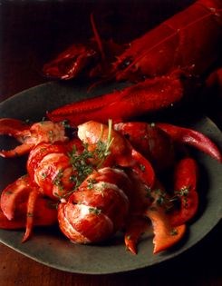 Poached lobster in court bouillon with butter sauce