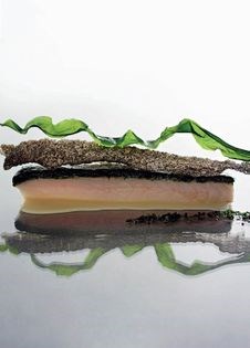 Poached Murray river cod with soft wakame crust, butter dashi, fried tonburi and puffed skin