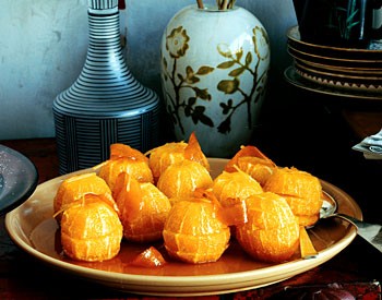 Poached oranges with candied zest and ginger