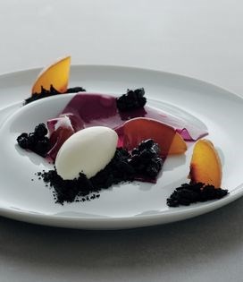 Poached peach with blueberries and magnolia ice cream