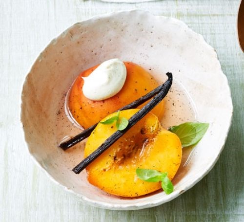 Poached peaches in sparkling wine with basil & vanilla