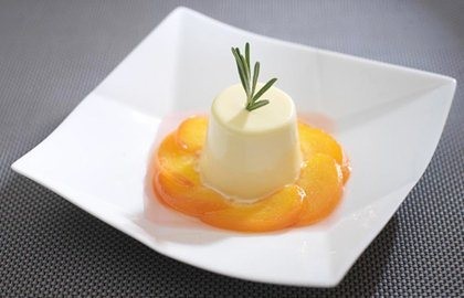 Poached peaches with rosemary cream