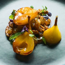 Poached pears with caramel sauce, Pedro Ximénez raisins and honeyed pecans