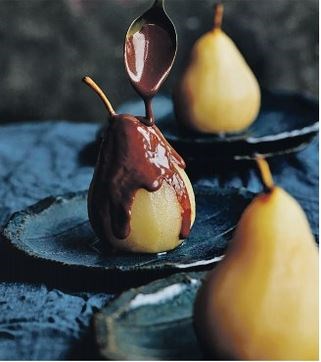 Poached pears with hot chocolate sauce