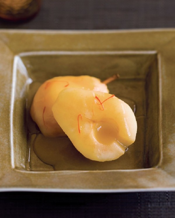 Poached pears with saffron broth