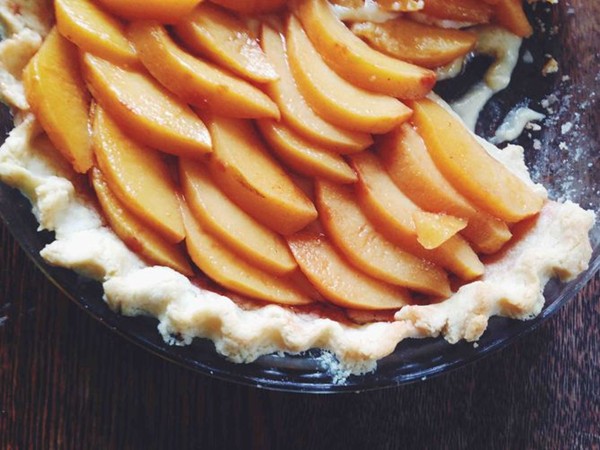 Poached quince almond tart