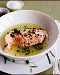 Poached salmon in a fresh herb and spring pea broth