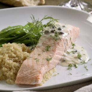 Poached salmon with creamy piccata sauce